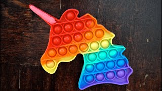 Rainbow Unicorn pop it toys fast vs slow fidget training [upl. by Anavahs]