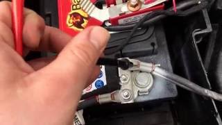 How to check the voltage of a car battery with a multimeter Renault Twingo 2 DIY [upl. by Lipsey]