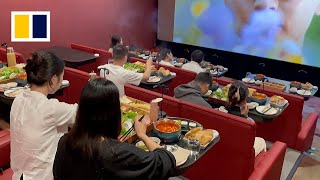 Moviegoers indulge in growing trend of ‘hotpot cinema’ [upl. by Ailenroc]