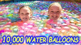 Filling Our Pool With 10000 Water Balloons [upl. by Eylk]