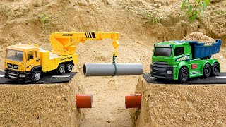 Rescue and play with crane truck construction vehicles  Toy car story [upl. by Lleruj]