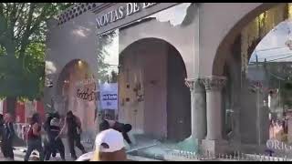 Rampaging Mexican feminists destroyed a bridal shop to protest traditional gender roles [upl. by Masuh]