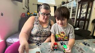 Christina builds a lego goomba set from Lego Super Mario [upl. by Ellerol]