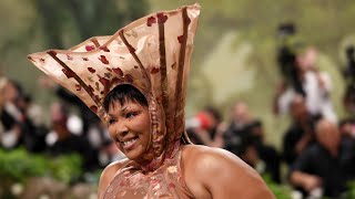 Lizzo shocks in coneshaped head piece for 2024 Met Gala  NBC New York [upl. by Atinav]