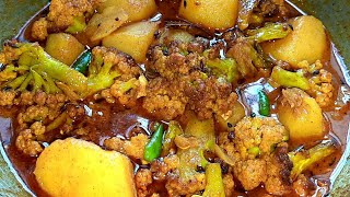 লক্ষীপূজার ভোগের আলু ফুলকপির দম।niramish aloo fulkopir dalna।cauliflower curry without onion garlic [upl. by Adias42]