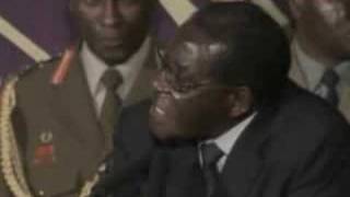 Zimbabwe Mugabe Agrees To Share Power [upl. by Rednasela]