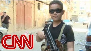 Child fighter with AK 47 on Syria border [upl. by Katine]