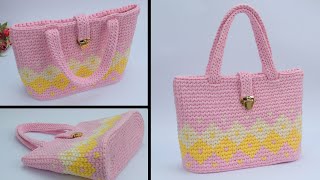 I fell in love with this Easy t shirt yarn crochet handbag tutorial [upl. by Leahcimsemaj]