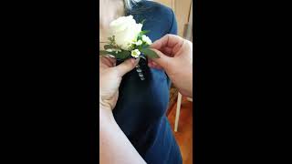 How to pin on a boutonniere on a shirt [upl. by Nicks]