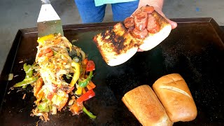 Andouille Sausage PoBoy Smothered in Onions Peppers Cheese  on Blackstone Griddle [upl. by Nihsfa]