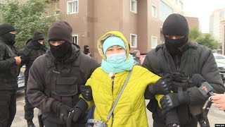 Kazakh Police Detain Demonstrators Demanding Release Of Relatives In China [upl. by Latsyk465]