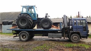 Volvo FL616 Hooklift Unloading a Ford 7700 [upl. by Hazlett85]