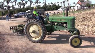 A Deere And A Couple Of Horses Discing A Field At The AEDGEampTA Show 2814 [upl. by Odlanyer]