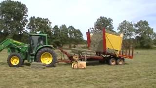 loading small square bale hay with 1033 balewagon newholland [upl. by Hartman739]