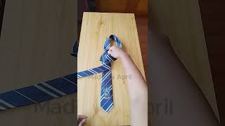 How to tie a tie on table  The quickest way to tie a necktie  Easy steps to tie a tie 10seconds [upl. by Ailey]