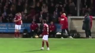 Dick Campbell gets hit on the head by clearance football during Arbroath Greenock Morton game [upl. by Dorri]