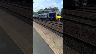 Northern Trains 323233 passing Levenshulme 14924 [upl. by Ahseyt883]