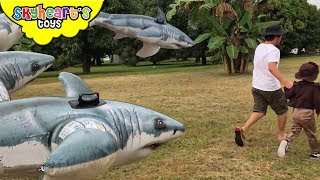 FLYING SHARKS vs Toddler  Skyheart battles an army of sharks for kids toys pool [upl. by Tehr]