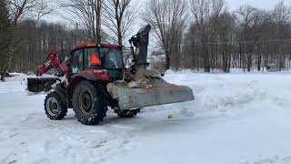 Case IH 75c with Cyclone 92quot inverted snowblower moving back snow banks [upl. by Lleder816]