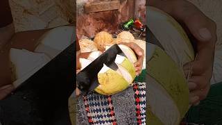 Skillful man peeling coconut very quickly fruit coconut cuttingskils streetfood shorts [upl. by Marilou]