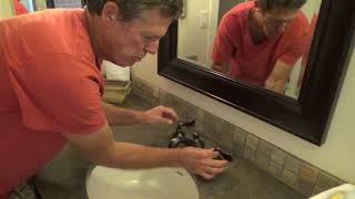 How to Repair Dripping American Standard Faucet in BathroomPart 1 [upl. by Epilihp]