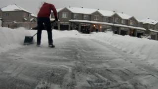 Efficient way to shovel driveway under 4min 30sec including snow from plow  How to remove snow [upl. by Ceporah]