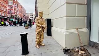 Gold man statue revealed how his daily routine works Setting up process explained Levetating trick [upl. by Silirama421]