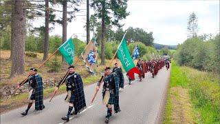 2024 Lonach Gathering Highlanders march through Strathdon in the Cairngorms National Park Scotland [upl. by Scibert]