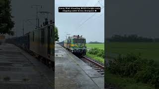 Gooty WAG 9 hauling BOXN Freight train skipping under heavy downpour ⛈️ [upl. by Alimaj]