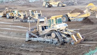 CAT D10N Dozers and 651E scrapers at work  Massive earth moving [upl. by Etsyrk]