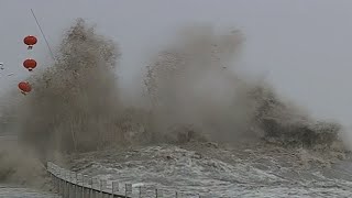 Aerial footage captures spectacular tidal bore on Qiantang River [upl. by Yrogerg914]