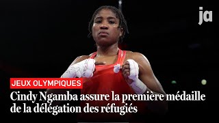 JO 2024  Cindy Ngamba assure la première médaille de lhistoire de la délégation des réfugiés [upl. by Yhtomit]