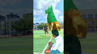 Mascot zodiac dog statue sapi placed on the football field girl slap and kick P338 [upl. by Motteo]