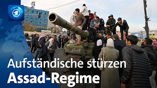 Aufständische stürzen syrischen Machthaber Assad [upl. by Aivull336]