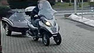 Piaggio MP3 250 LT with Freewheel Doggy Trailer [upl. by Akimrej]