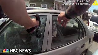 Philadelphia officer charged with murder after bodycam video shows him firing into car [upl. by Htnnek679]