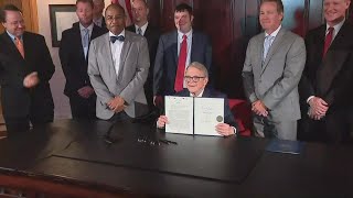 Ohio Gov Mike DeWine signs House Bill 168 allocating portion of 22 billion to economic recovery [upl. by Refannej61]