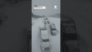 Drone Footage Trucks Trapped in Snow in California [upl. by Araccot]