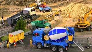 Bruder TRUCKS for Kids 👍BRUDER Excavators excavate DINO SKELETON [upl. by Annehsat831]