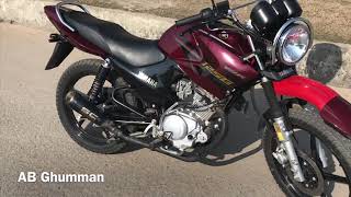 Yamaha YBR 125G Modified Exhaust Sound SC Project Cut Fly By and fire shots in Pakistan [upl. by Halette]