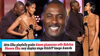 Idris Elba playfully grabs kisses glamorous wife Sabrina Dhowre Elba racy display stage NAACP Image [upl. by Kellyann]