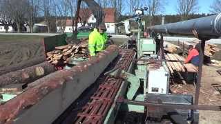 Mobile sawmill on a truck with a blade and movable saw table a mans job that takes care of everythi [upl. by Santiago]