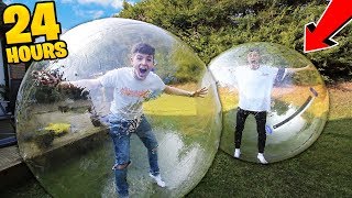 SPENDING 24 HOURS INSIDE A BUBBLE BALL bad idea [upl. by Aerdnod]