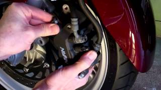 NT700V Front Wheel Removal [upl. by Atinat]