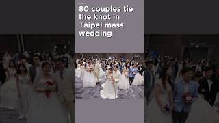 80 couples tie the knot in Taipei mass wedding [upl. by Annodal661]