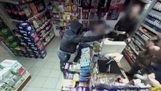 SHOPKEEPER FIGHTS OFF GUNMAN WITH DRINK CANS  BBC NEWS [upl. by Fransis744]