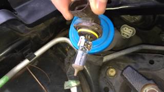 How to Replace a Headlight Bulb in a 20012005 Honda Civic Driver Side [upl. by Nylarahs338]