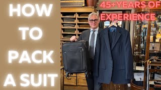 How to pack a suit in a suitcase [upl. by Miltie]