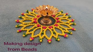 Beaded article making step by stepमोत्याची महिरप शिकवणी 72diya sajavat ideas [upl. by Enaira]