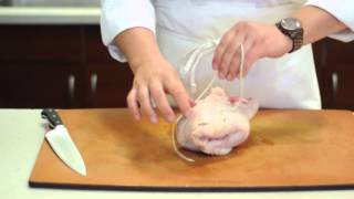 Culinary Schools  Tutorial How To Truss A Chicken [upl. by Aryad]